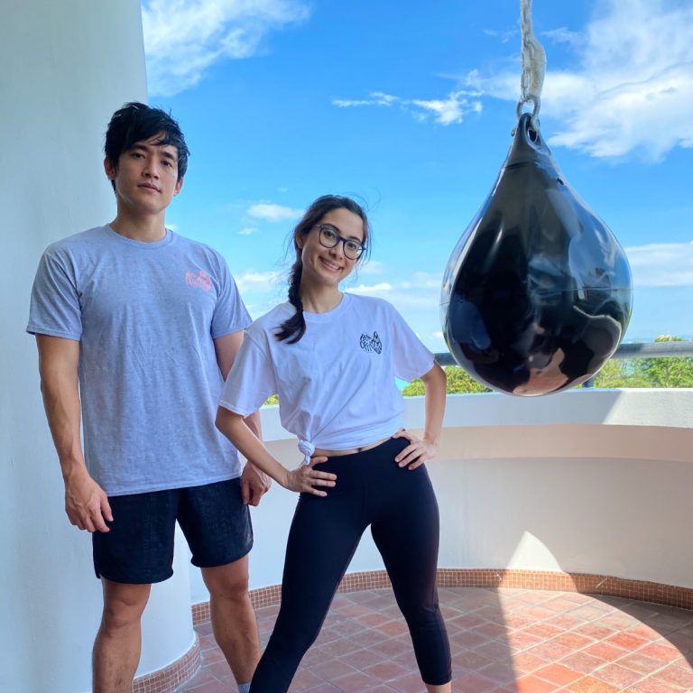 Abel Koh and Nerissa Assudani, the founders of Box Office Fitness, posing on a patio