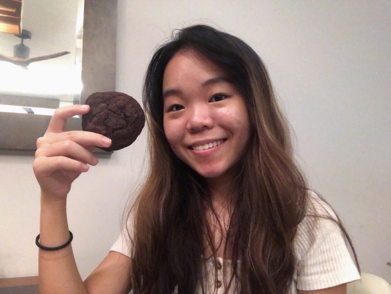 Urbanwire writer Hannah Fletcher with her baked cookie