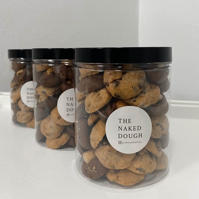 Three containers' worth of cookies baked by Instagram blog shop The Naked Dough