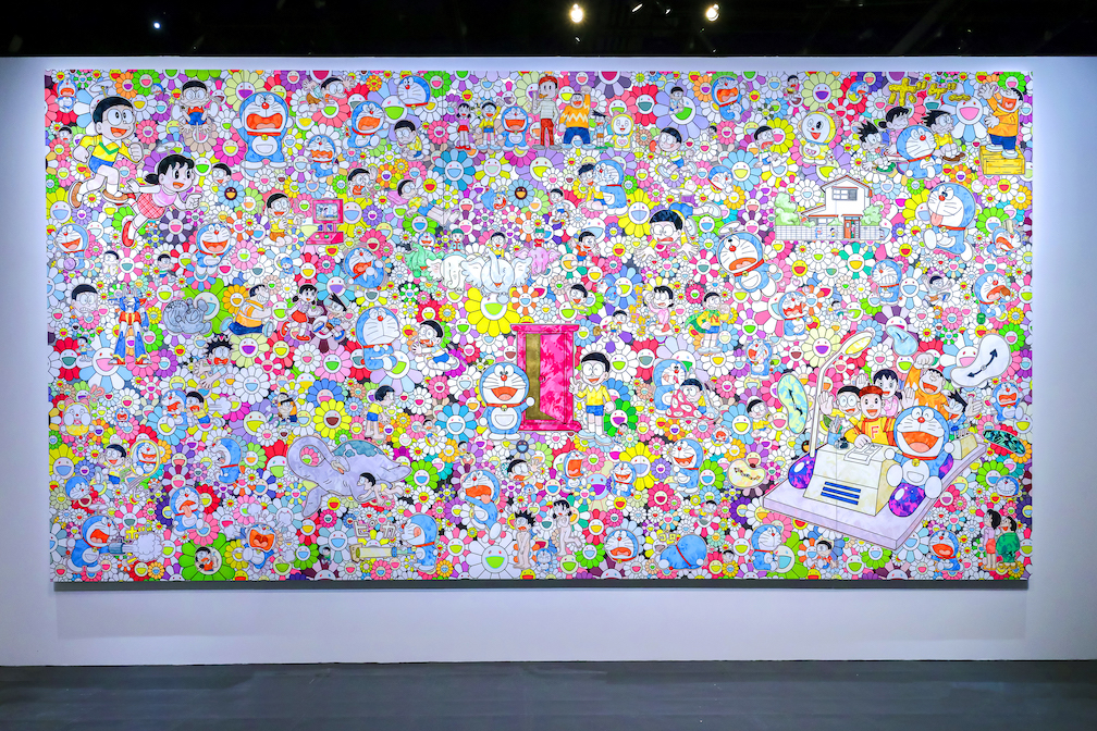 A large colourful mural with Takashi Murakami flowers and iconic Doraemon scenes