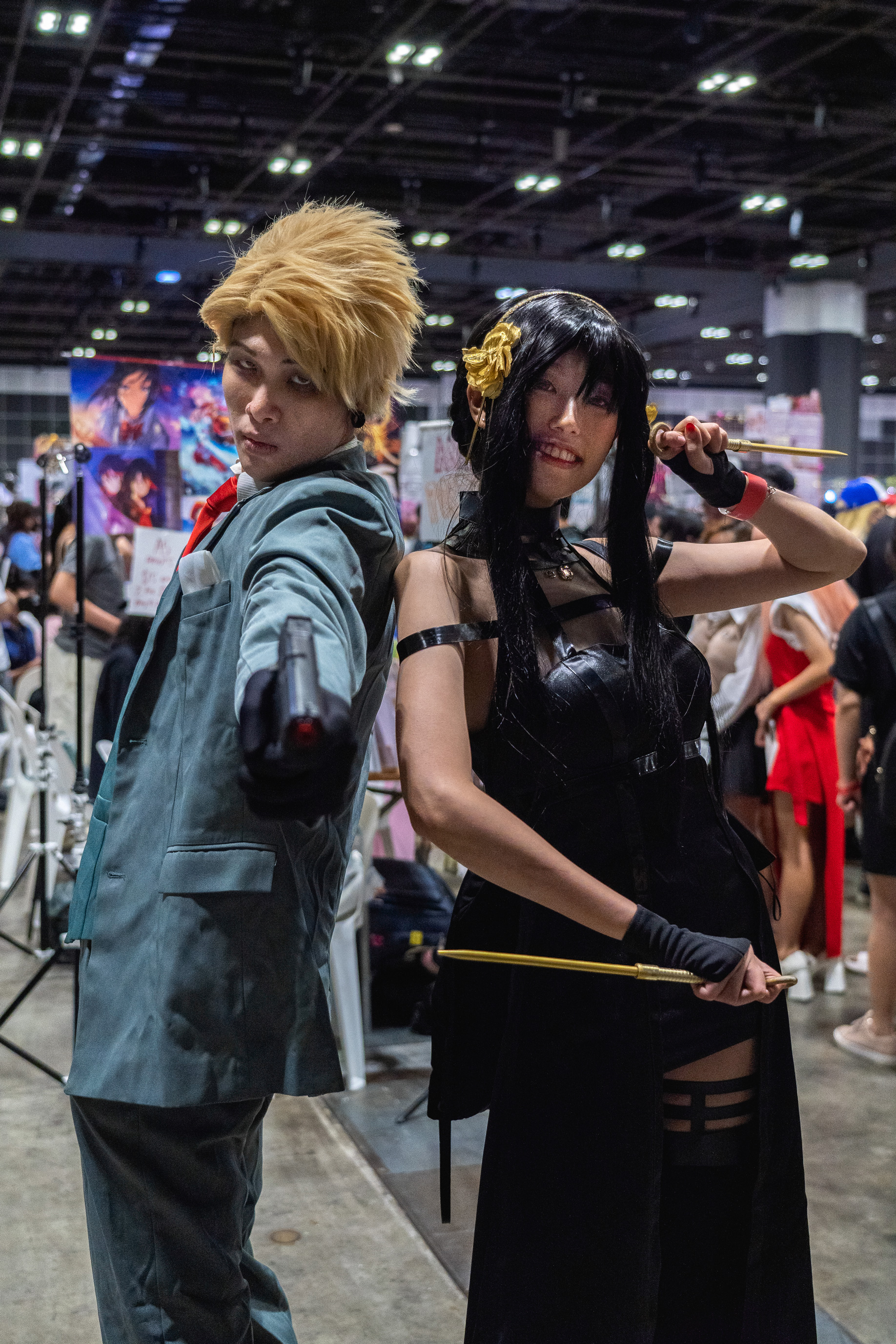 Cosplayers, Kelly (Left) and Shiny (Right), dressed as Loid and Yor Forger from Spy X Family and posed for The UrbanWire. 