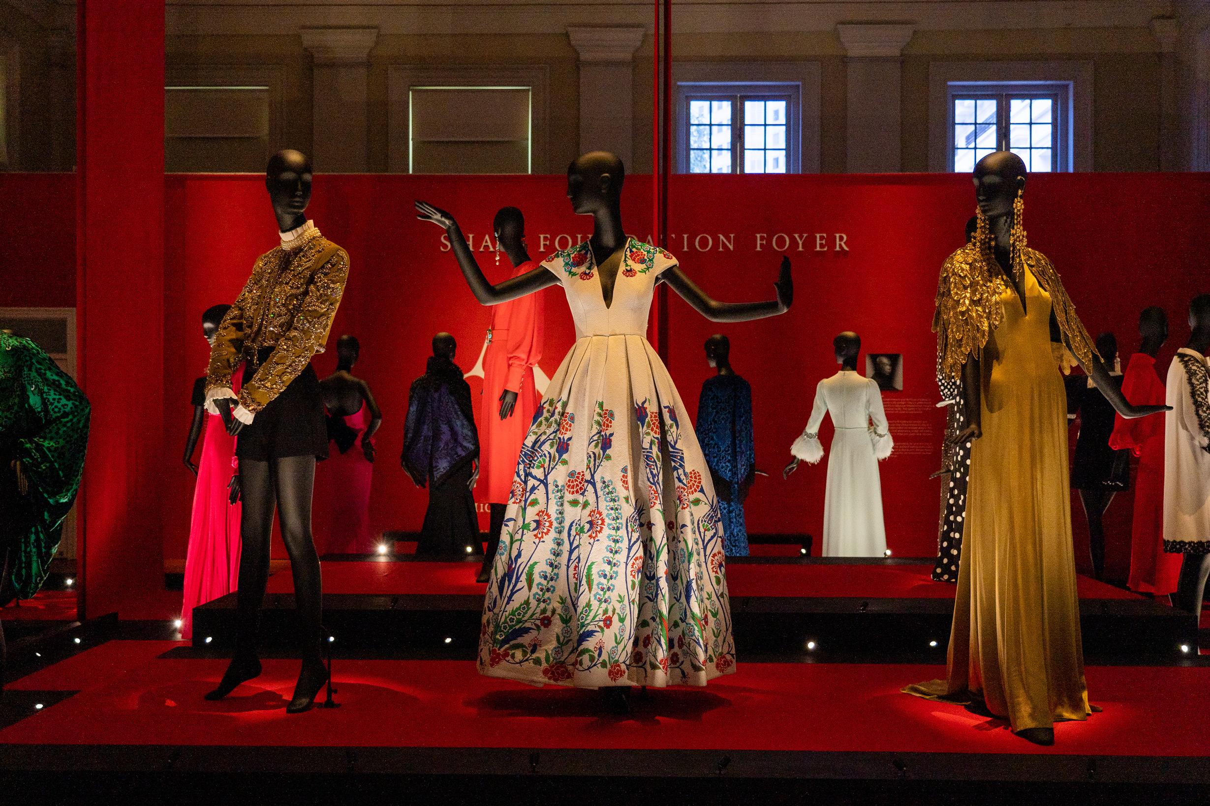 Showcase of the dresses in the ‘In The Global Eye’ section of the exhibition which features dresses that were worn by remarkable women.