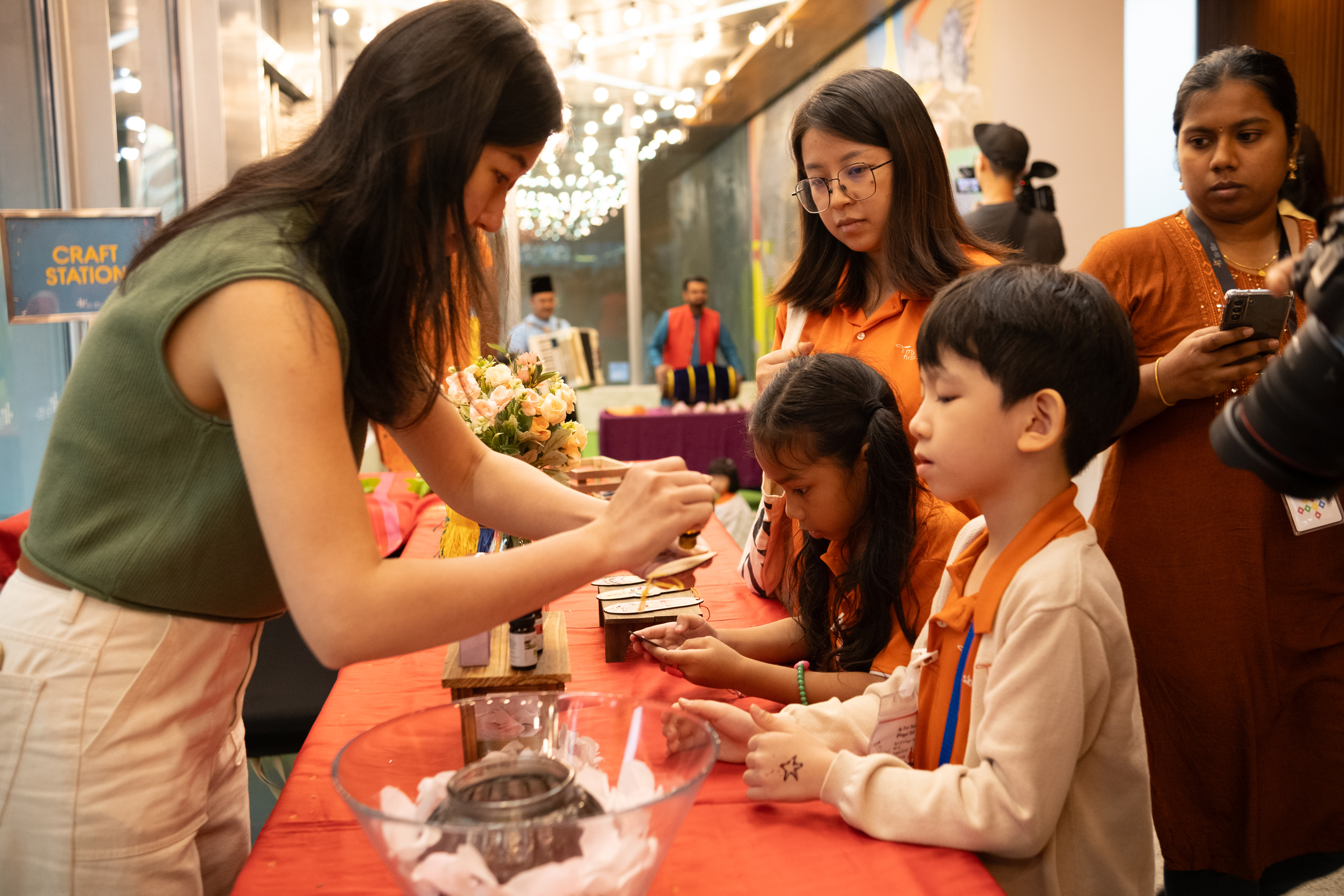 Drop-In Craft Station: Perfumed Hanging Shoe Craft activity at the Indian Heritage Centre. 