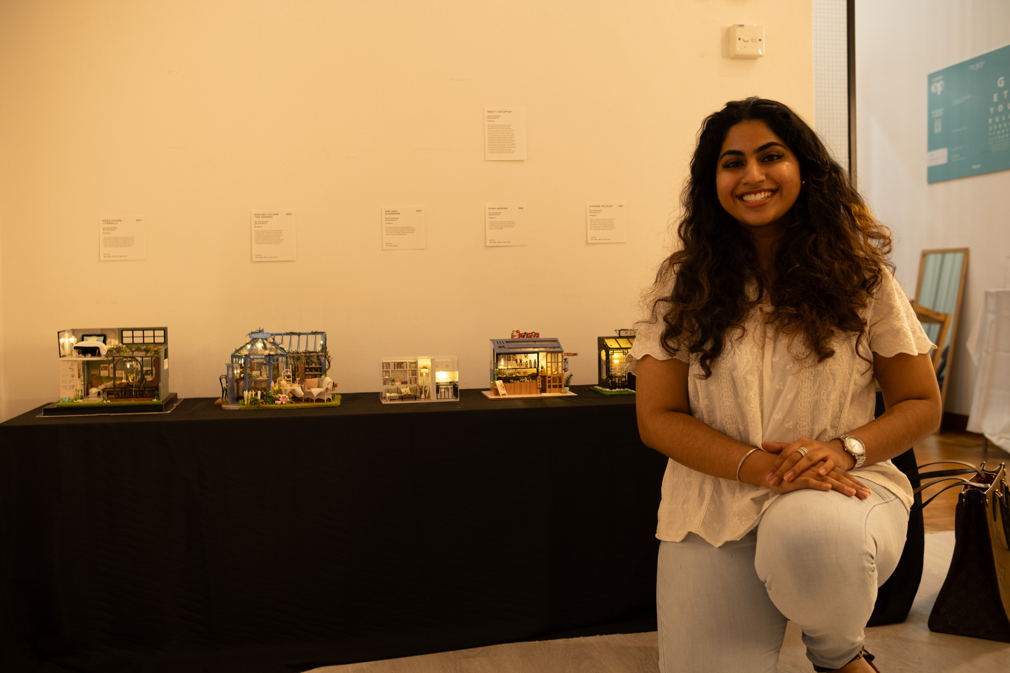 Ms Namrata with her dollhouses.