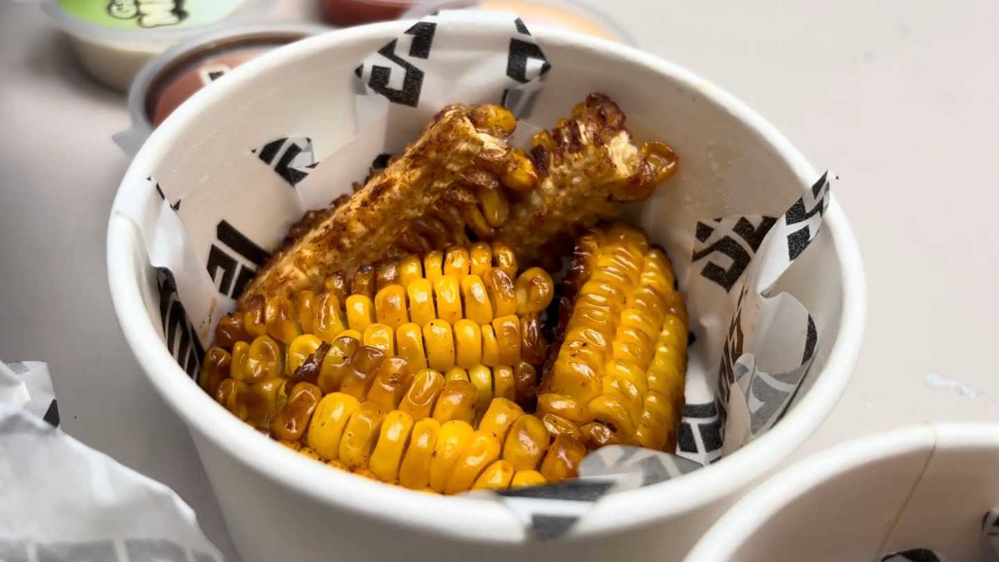 The corn ribs featured grilled, quartered corn cobs lightly sprinkled with seasoning. Photo by Jorius Chuwa